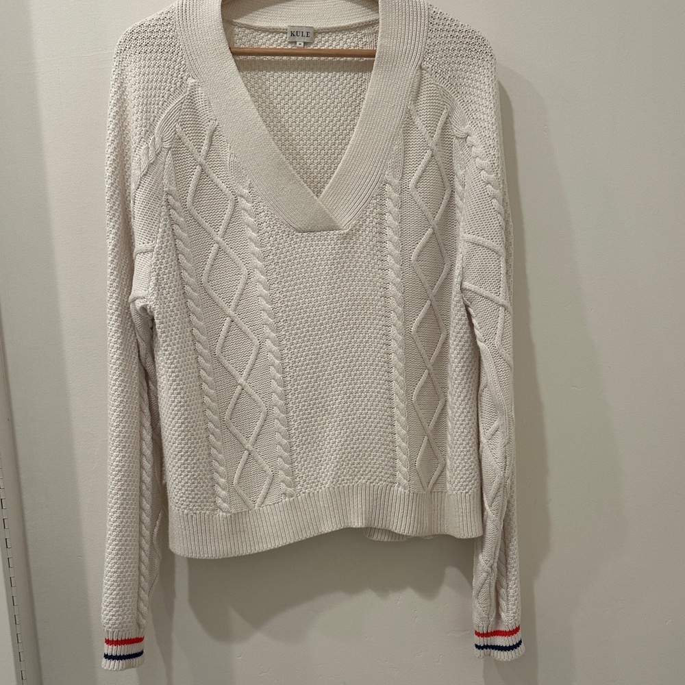 KULE Cream V-Neck Cable Knit Sweater with red/blue stripe trim